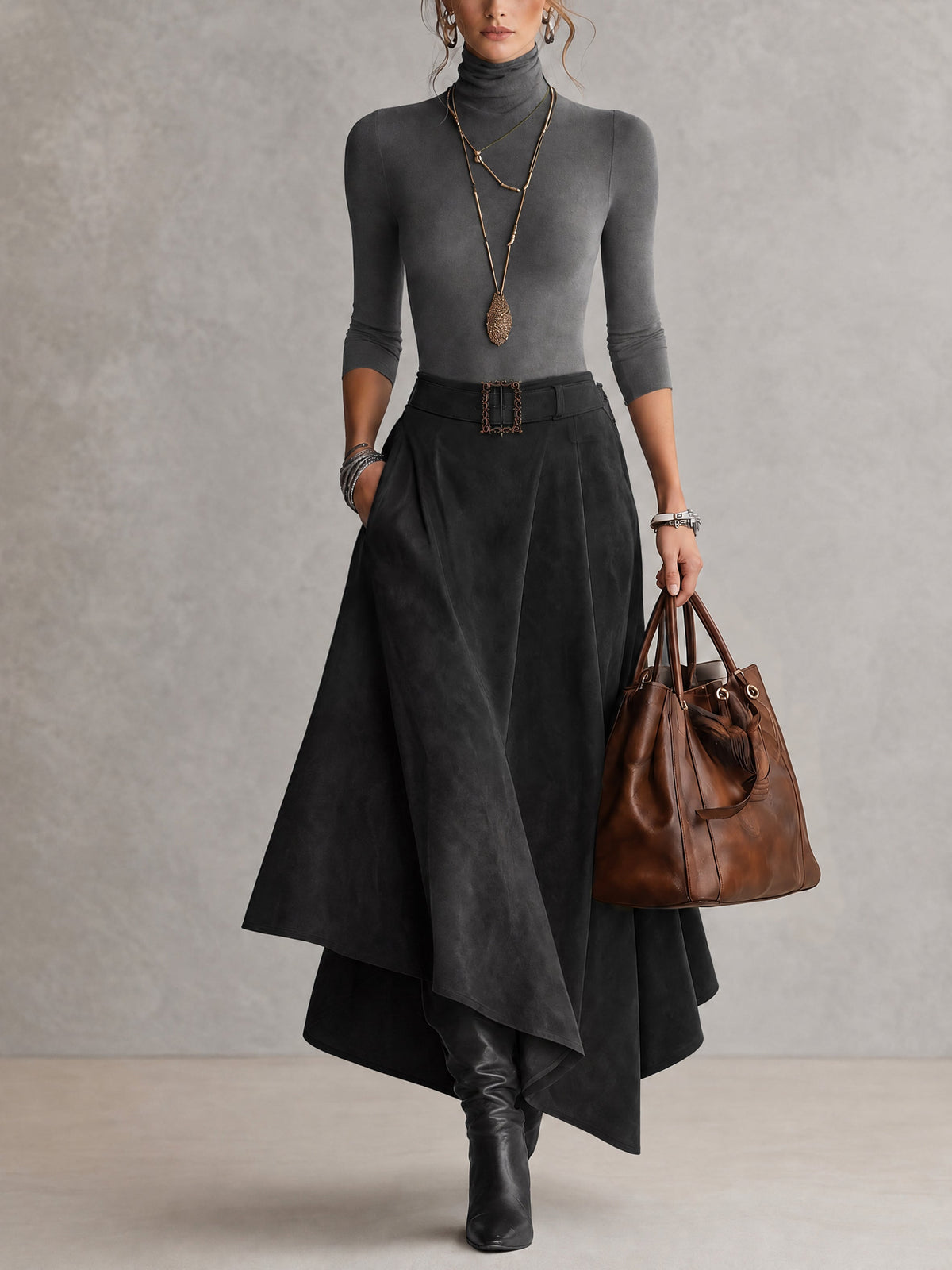 Amparo | Conjunto de color topo, de punto, con cuello alto y falda asimétrica con efecto ante