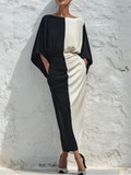 Conjunto de dos piezas compuesto por un top y una falda midi en contraste de colores blanco y negro