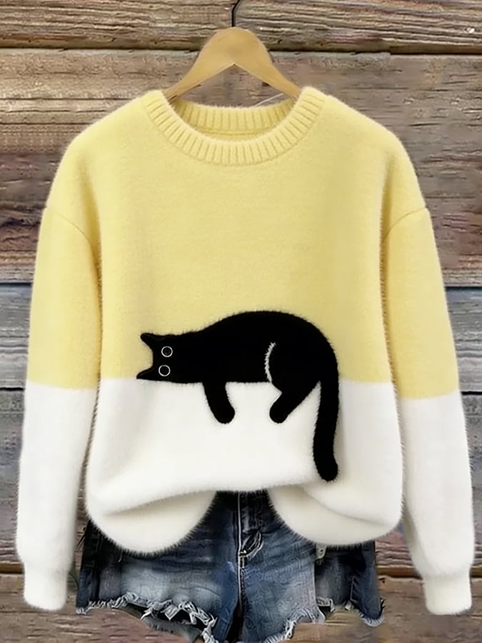Cristina | Jersey oversize elegante con un gato