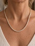 Collar de oro con motivo de tenis