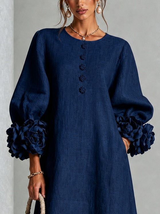 Vestido midi azul marino con botones con motivos florales y mangas con extravagantes motivos florales