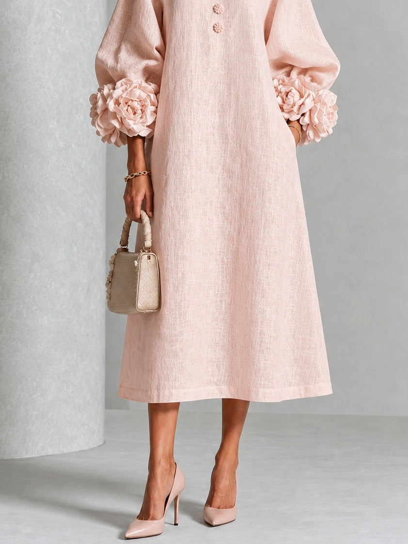 Vestido midi rosa con botones con motivos florales y mangas con motivos florales extravagantes