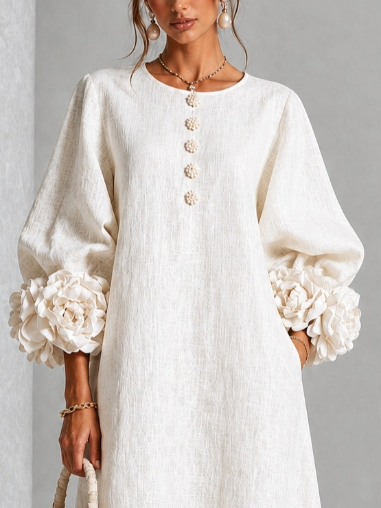 Vestido midi blanco con botones con motivos florales y mangas decoradas