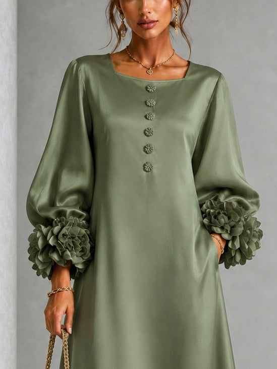 Vestido midi de satén verde salvia con mangas florales de declaración