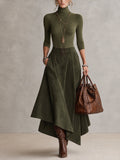 Amparo | Conjunto verde con top de cuello alto y falda midi asimétrica de imitación de ante (con cinturón)
