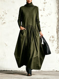 Lorena | Vestido largo oversize con cuello alto y bolsillos grandes