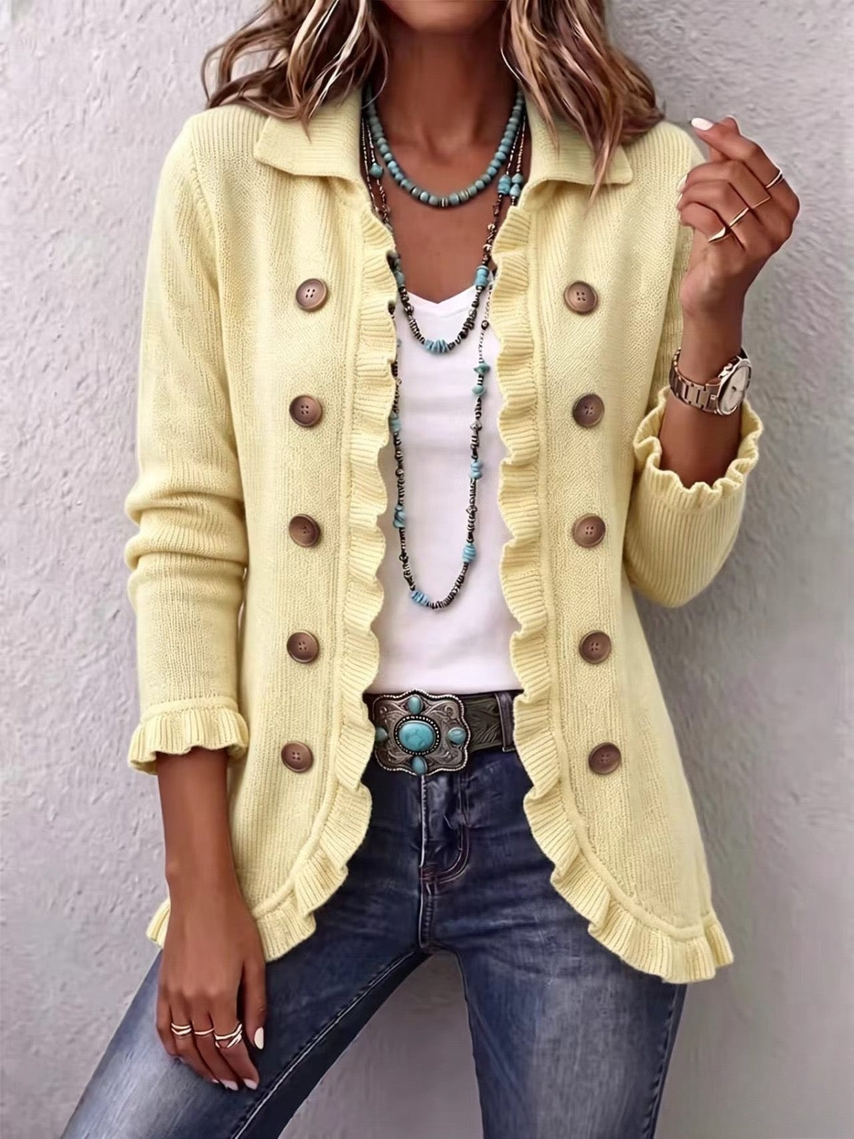 Grecia | Chaqueta de punto color crema con volantes