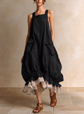 Antonia | Vestido de corte globo con bolsillos y bajo con volantes