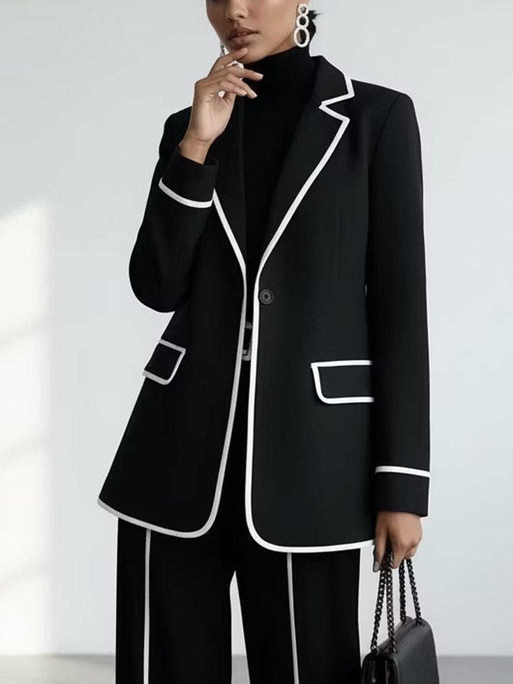 Clementina | Conjunto de chaqueta y pantalón con ribetes en contraste, negro